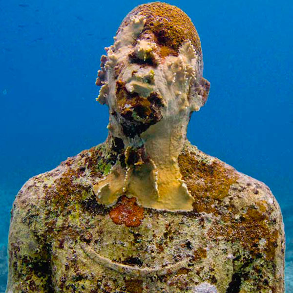 jason decaires taylor man on fire in musa sculpture underwater manchones